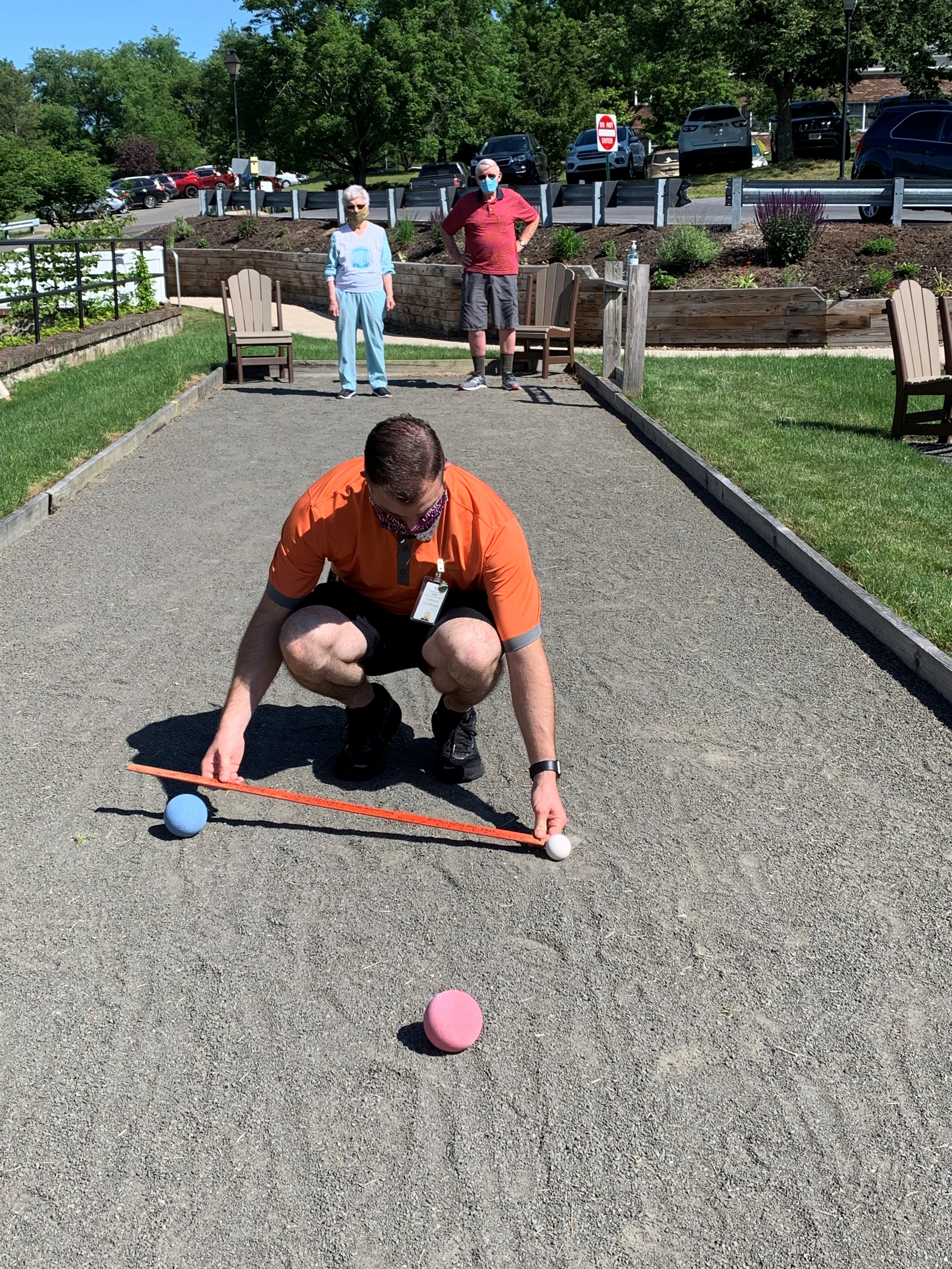 Bocce Ball Kaleb Roudabush checking the distance