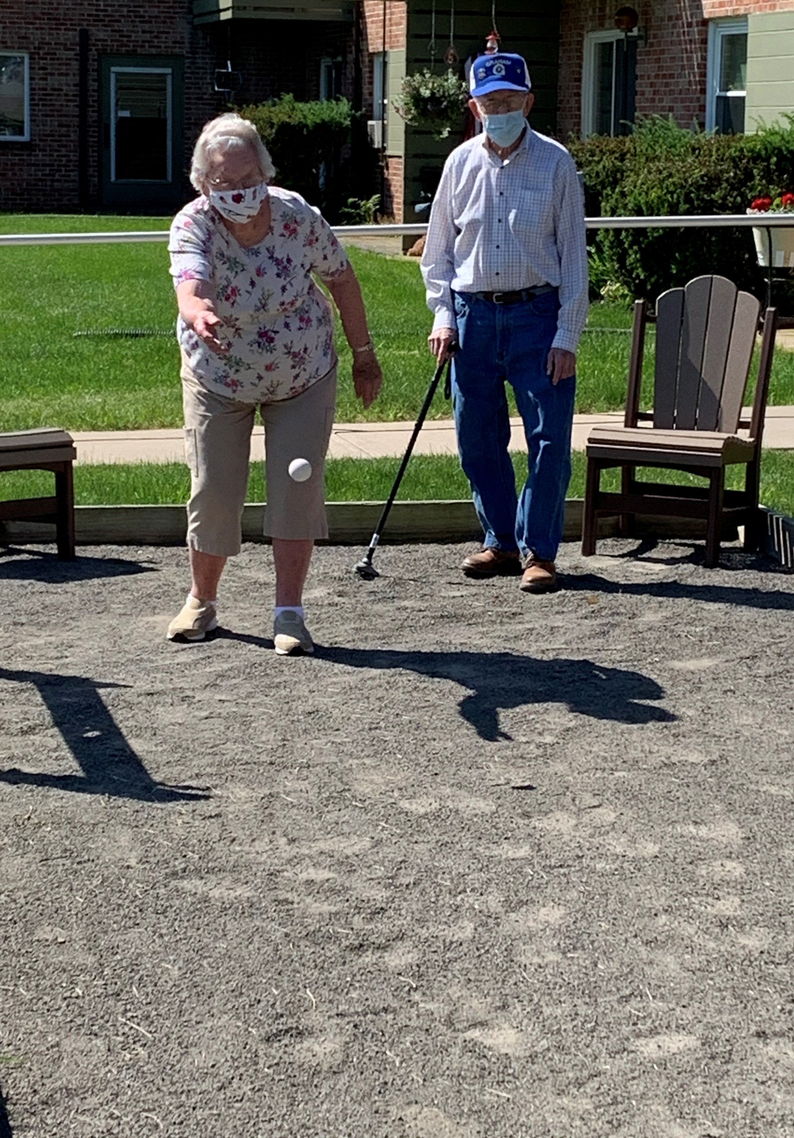 Bocce Ball Norma Peacock tossing Pallino ball