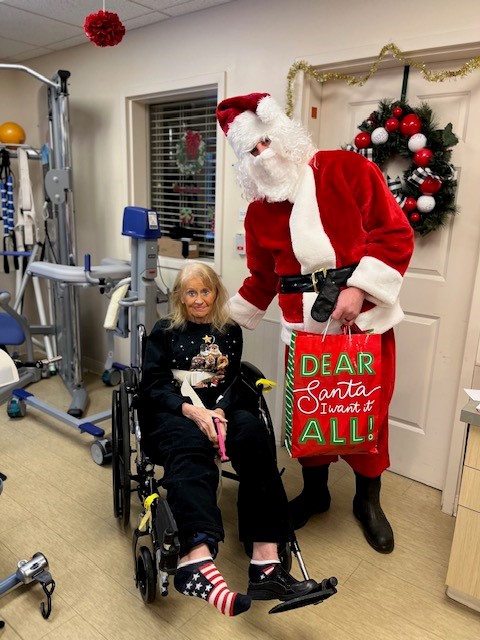 Bonnie Wileman with Santa