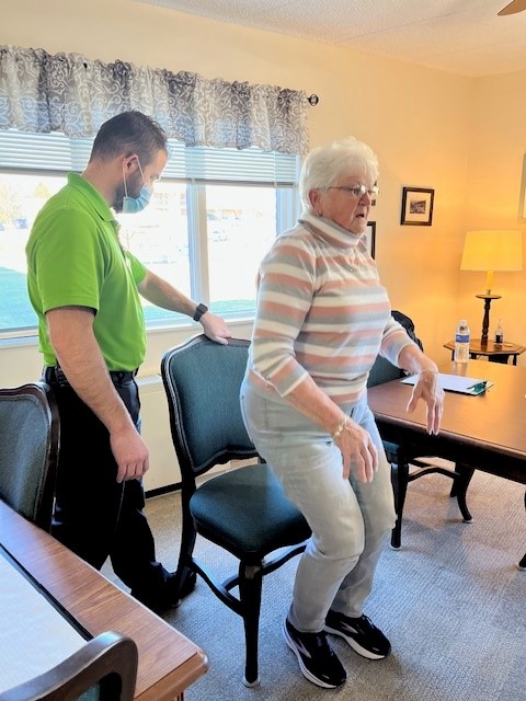 Donna Allen getting up and down a chair