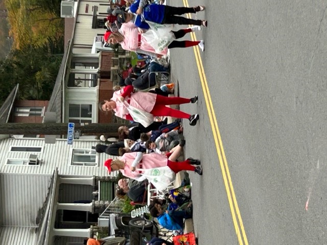 Girls handing out candy