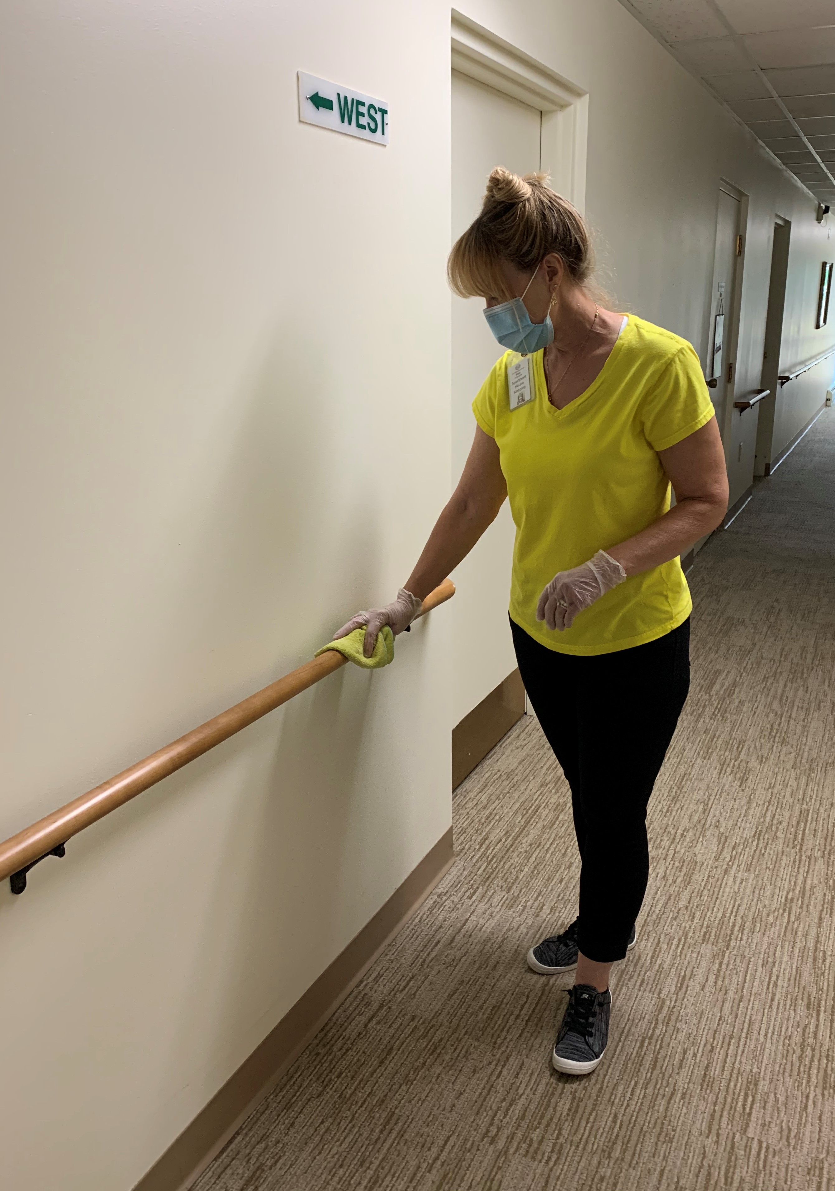 Sanitizing handrails with Pam 2
