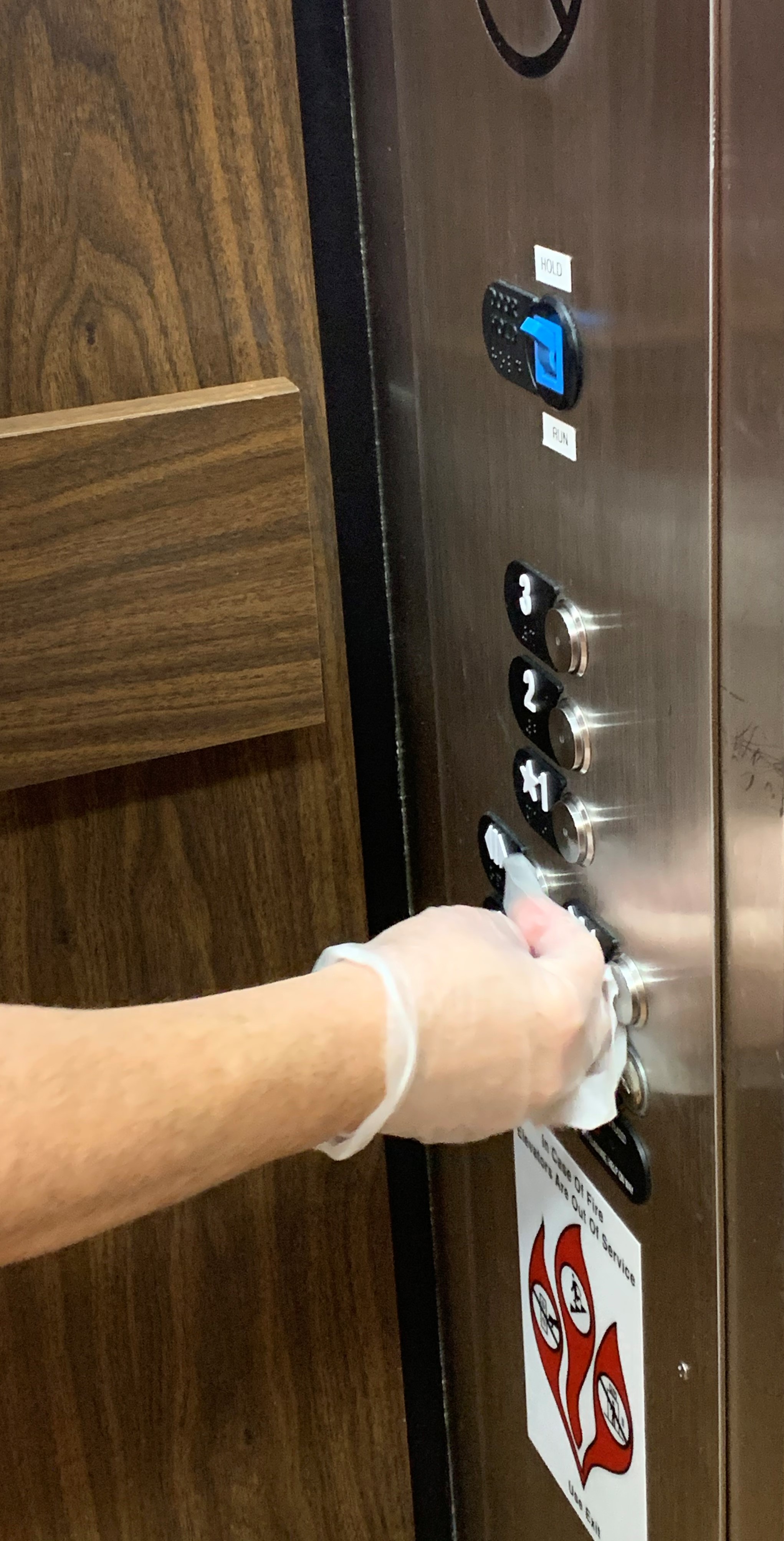tammy sanitizing elevator buttons3